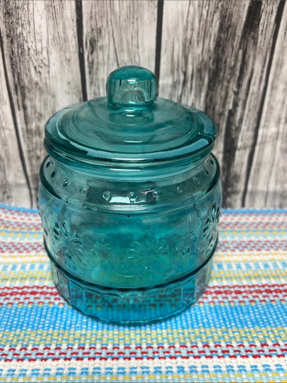 The Pioneer Woman “Cassie” glass embossed canister-small 33oz- 5”x5.75”- Teal